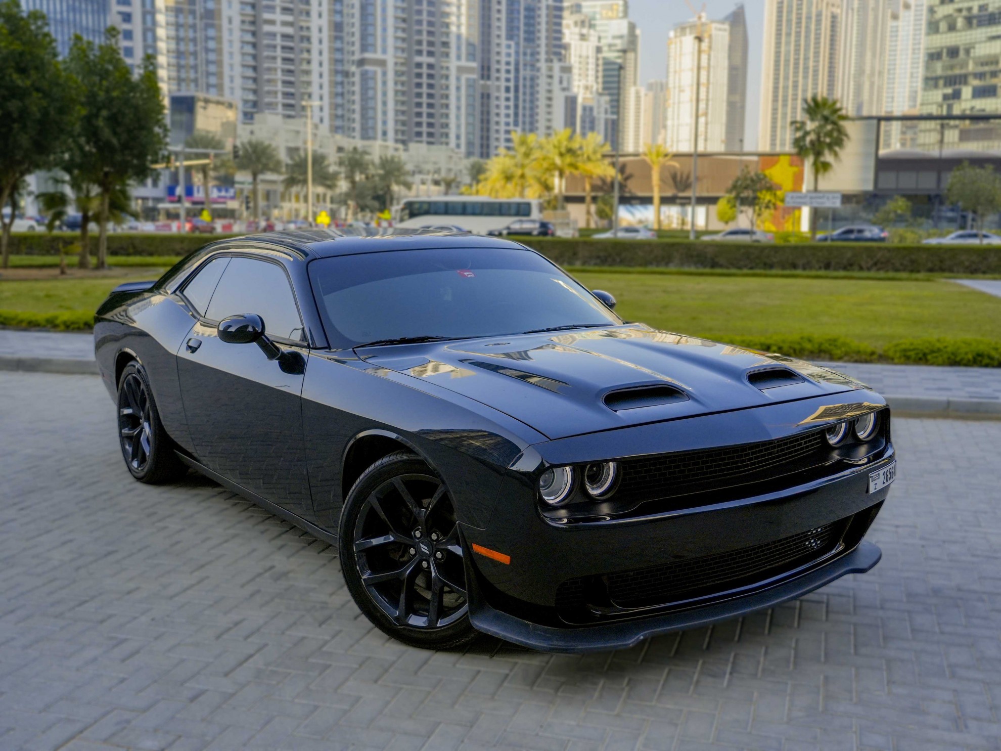 https://www.quickdrive.ae/uploads/2023/02/01/Dodge Challenger V6 2021 (1).jpg